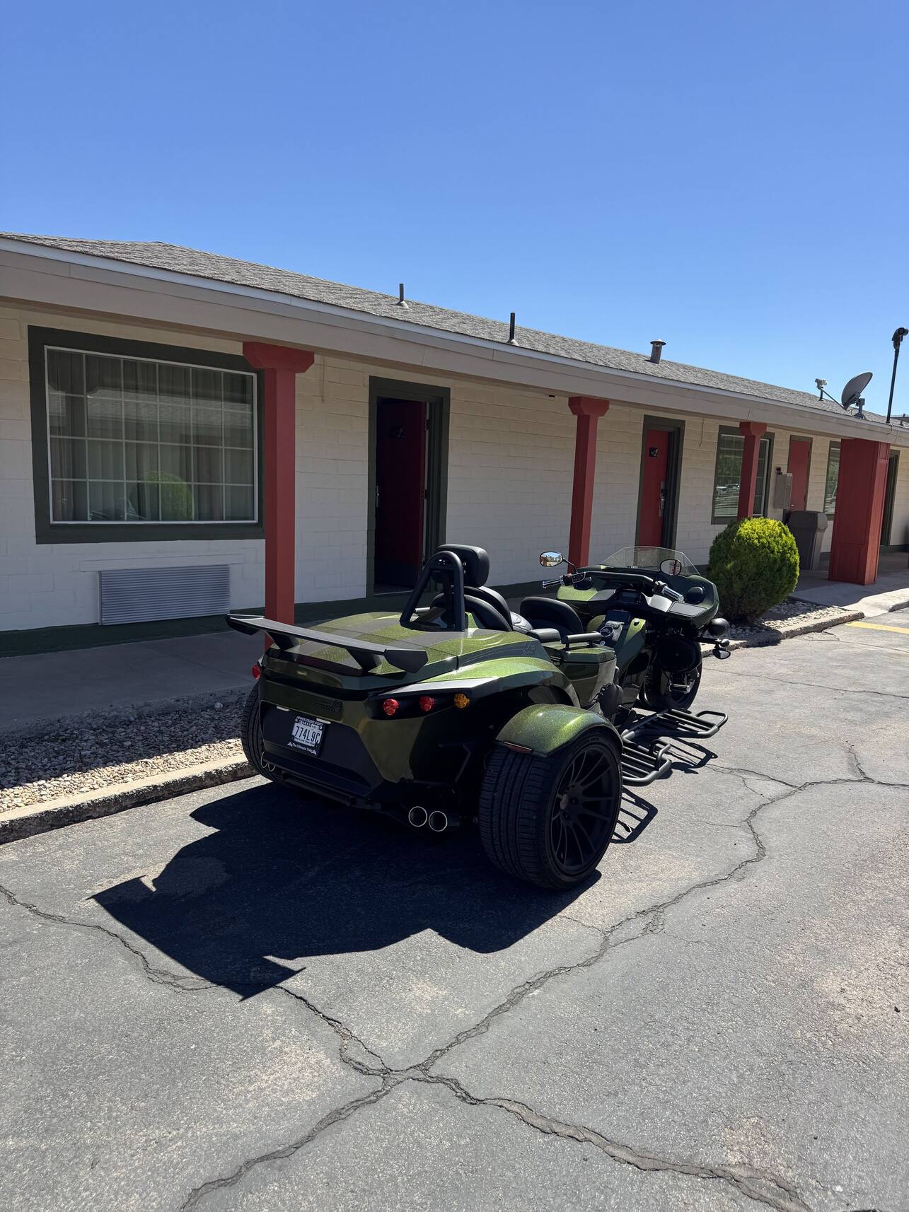 Rewaco trike parked at a roadside motel