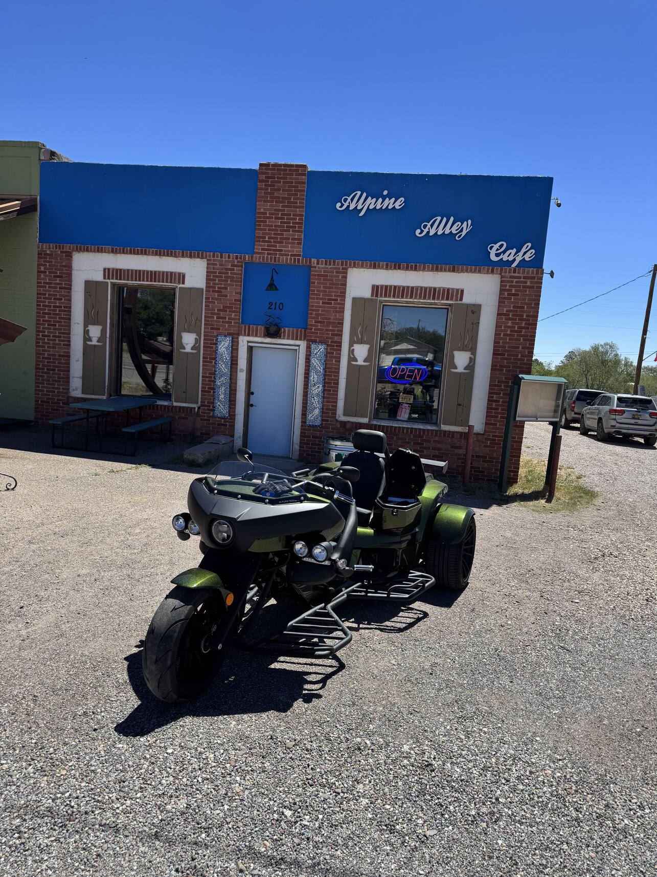 Rewaco trike parked at a small-town cafe